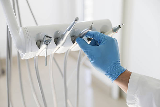 Professional Tooth Extraction technician working in La Harpe, IL